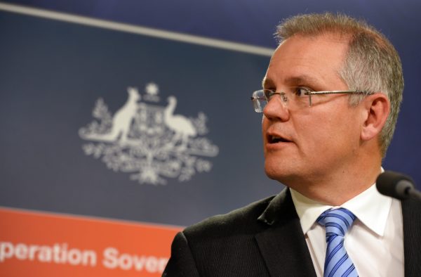 Australian Minister for Immigration and Border Protection Scott Morrison speaks on the new federal government's Operation Sovereign Borders policy during a press conference in Sydney on September 23, 2013 promising a tougher approach on asylum-seekers arriving by sea as part of the government's promise to "stop the boats". Asylum-seekers arriving by boat in Australia will be sent to Papua New Guinea and Nauru island more quickly under the new government. AFP PHOTO/William WEST (Photo credit should read WILLIAM WEST/AFP/Getty Images)